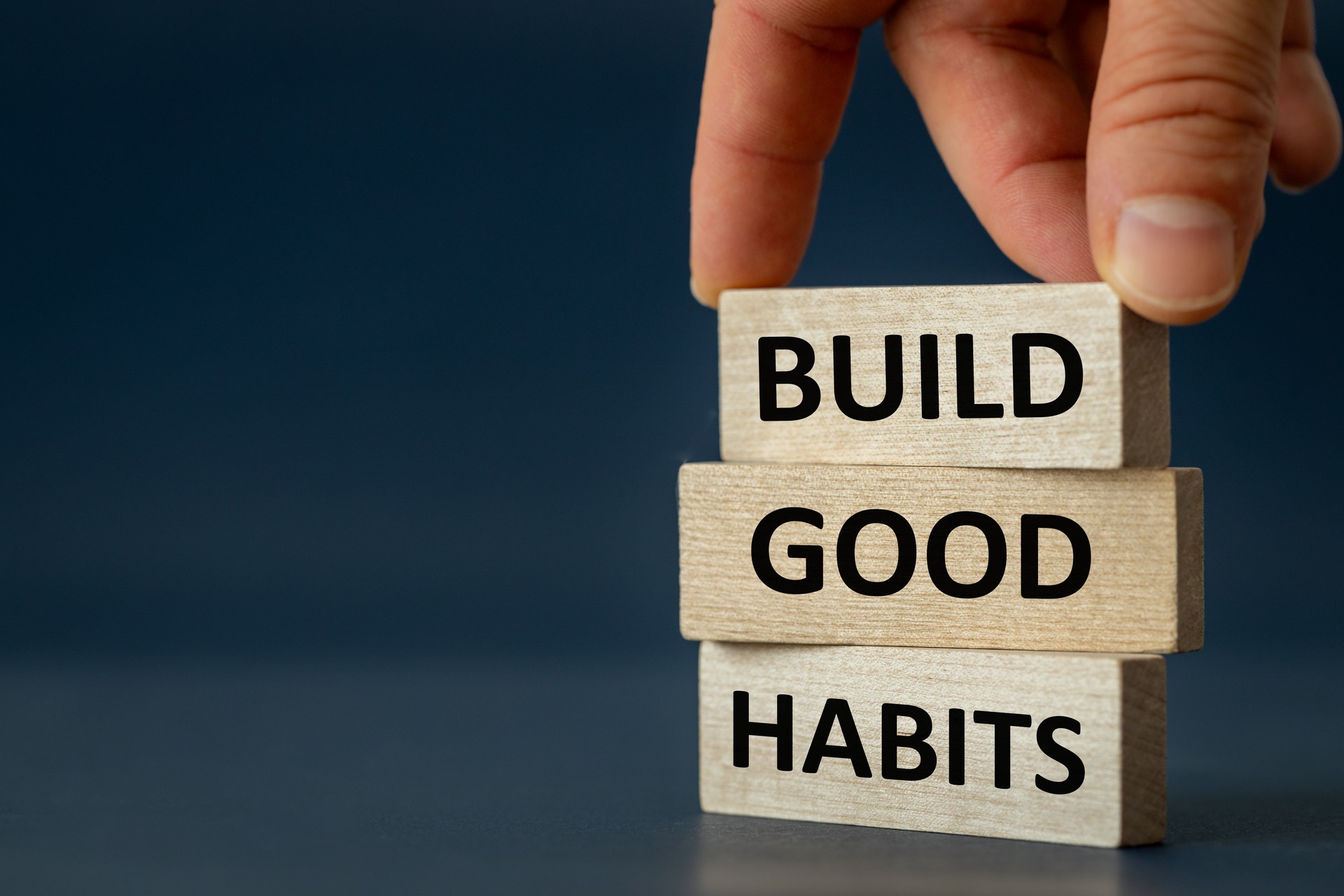 Build Good Habits Symbol, Concept, Wooden Blocks with "Build Good Habits" Motto Navy Blue Background, Copy Space, Psychology, Business, Successful Building Good Habits Concept